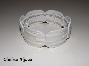 Bracelet élastique bitume en émail ivoire sur métal blanc